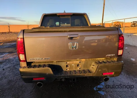 2022 Honda Ridgeline Rtl z USA, uszkodzony, nr VIN 5FPYK3F71NB010541